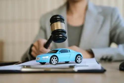 A lawyer signing a car contract