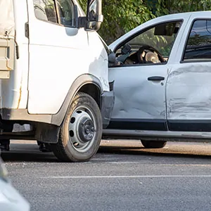 Polk County Accident: Government truck colliding with a white car on a Polk County, Florida road.