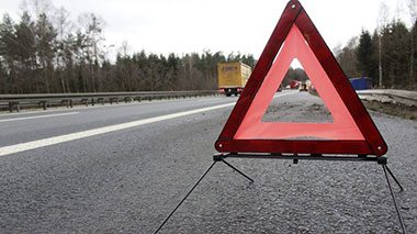 Dangers Of Trucks Stopped On Interstate Shoulder