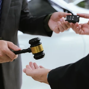 Car accident mediation lawyer holding a gavel.